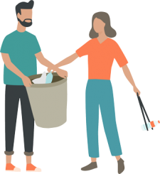 Man and woman cleaning up rubbish at a beach park