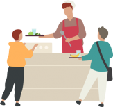 Two children being served food at a canteen