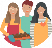 young man with a young woman each side, one of them holding a tray of muffins fresh from the oven